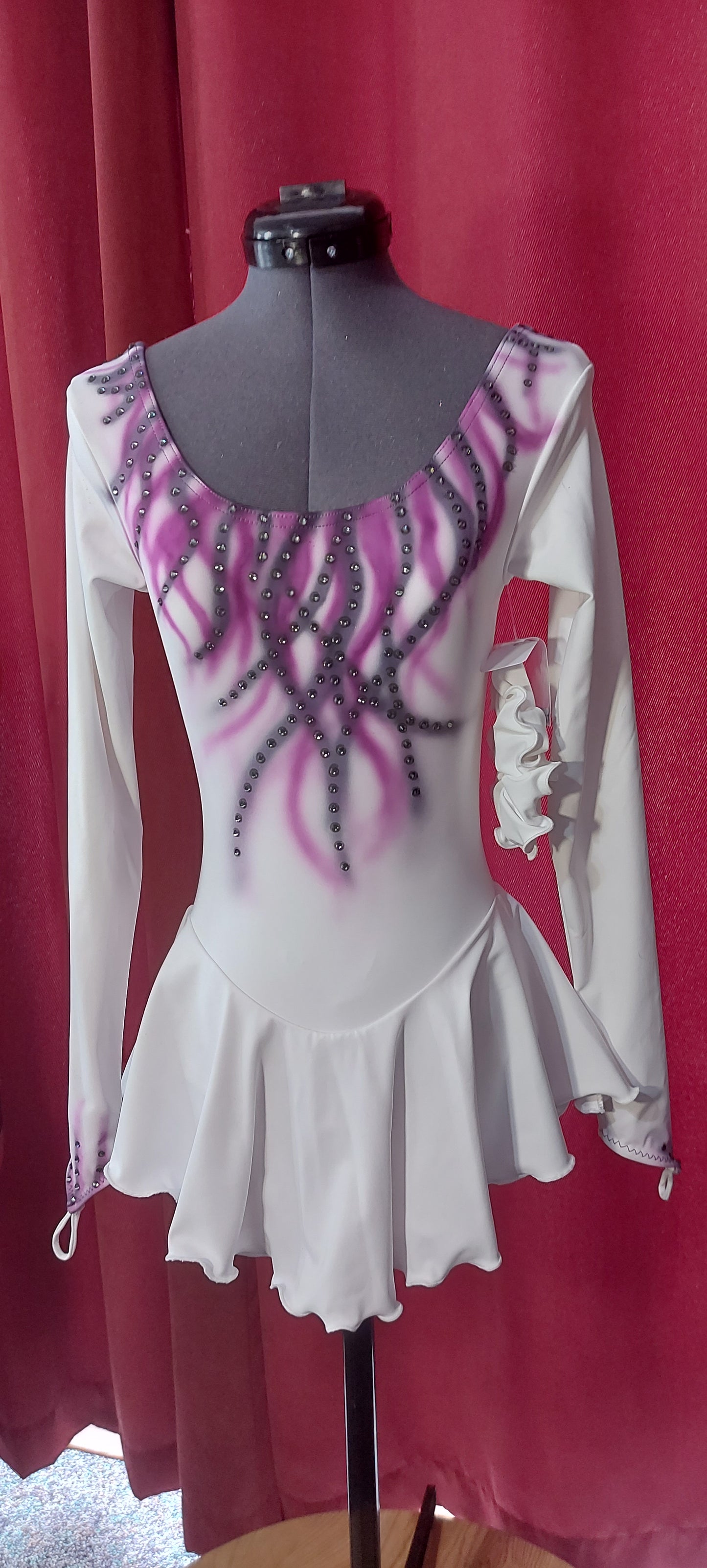 White airbrushed figure skating dress