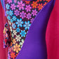 Fun flower power gymnastics suit